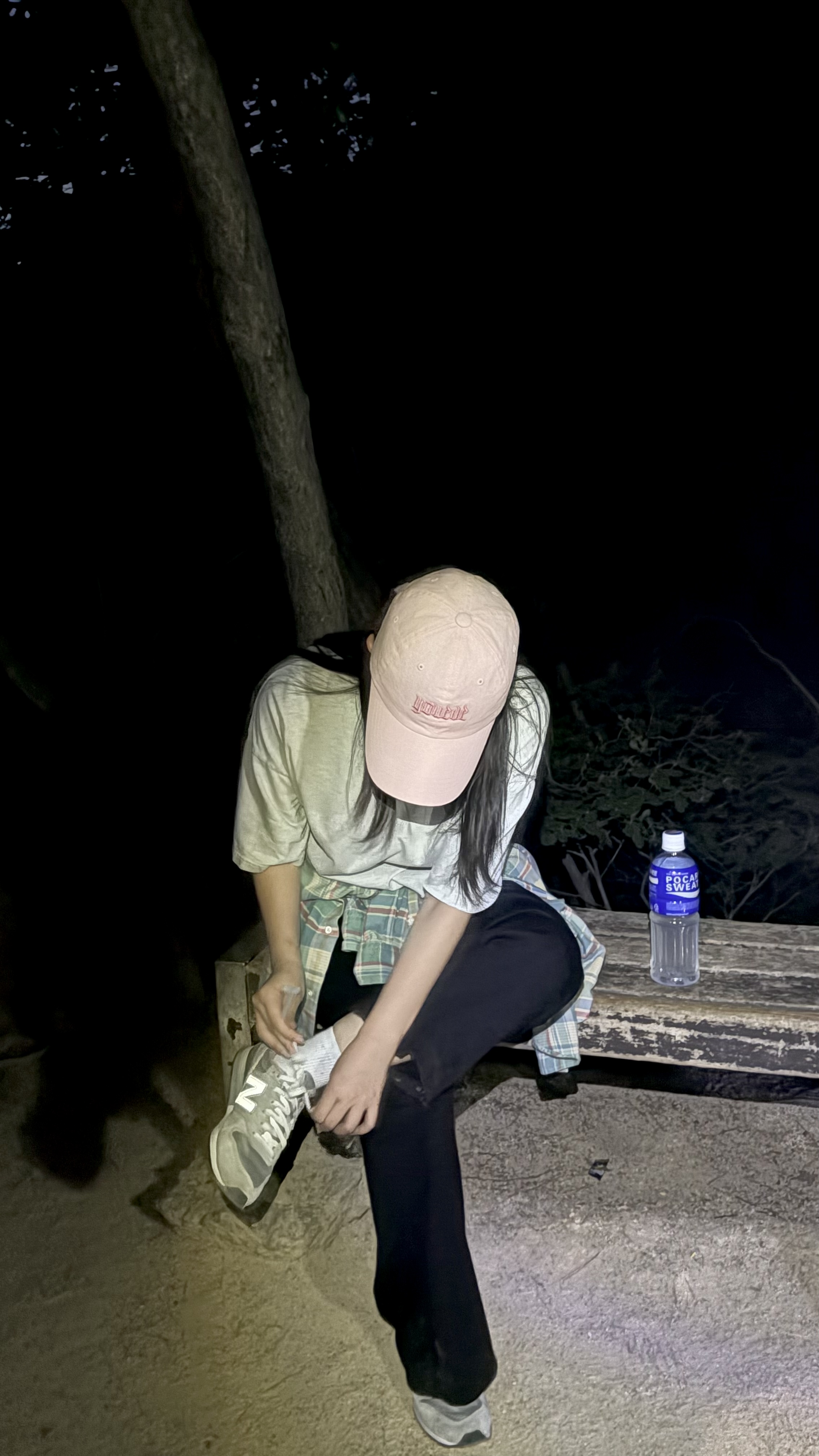 Tying my shoes during a night hike